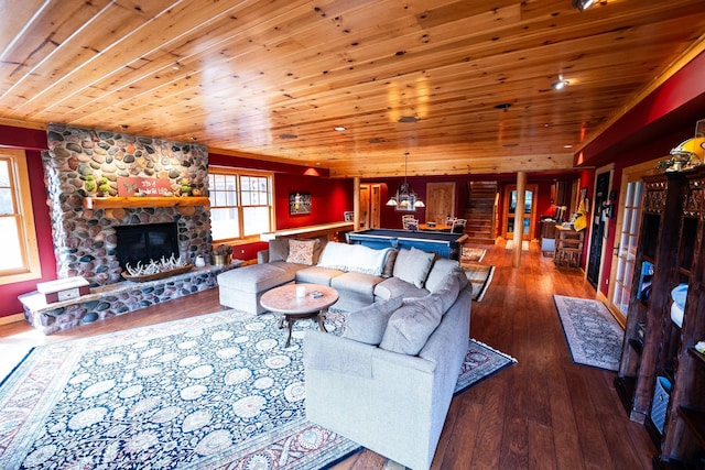 living room featuring wood ceiling, a fireplace, dark hardwood / wood-style flooring, and billiards