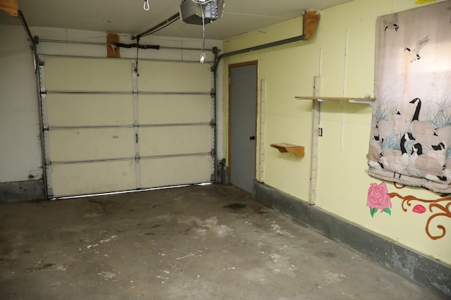 garage featuring a garage door opener