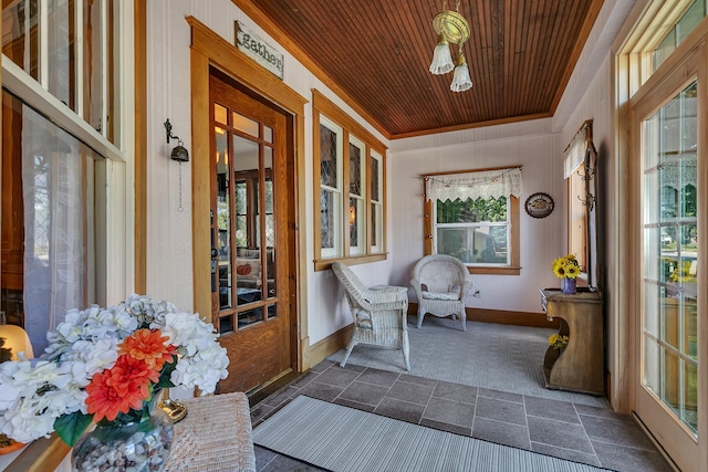 sunroom / solarium with wooden ceiling