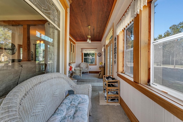 sunroom with wood ceiling