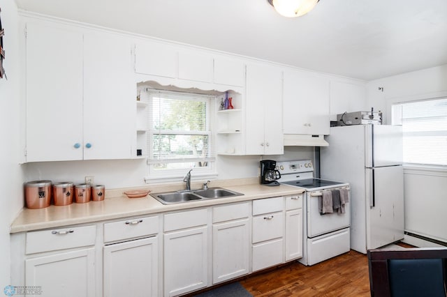 kitchen featuring sink, white appliances, white cabinetry, and dark hardwood / wood-style flooring