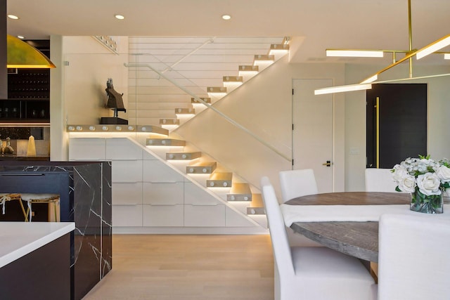 interior space with recessed lighting and wood finished floors
