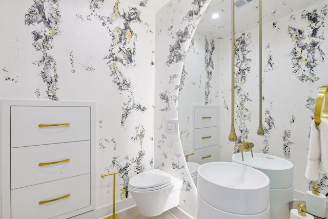 bathroom featuring toilet