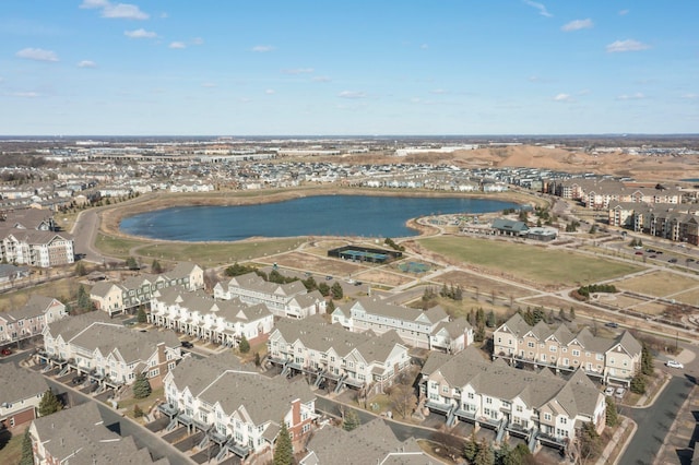 aerial view featuring a residential view and a water view