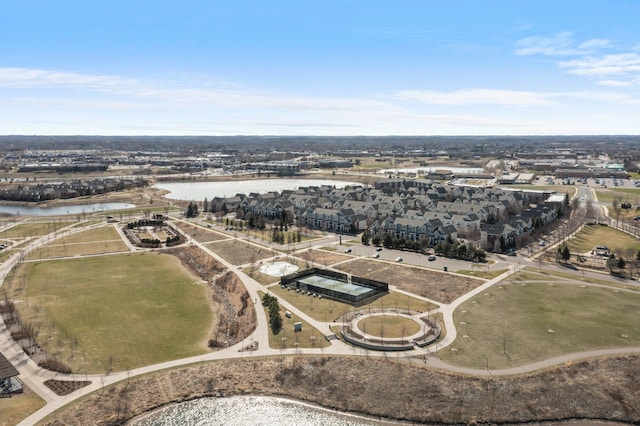 aerial view with a residential view and a water view