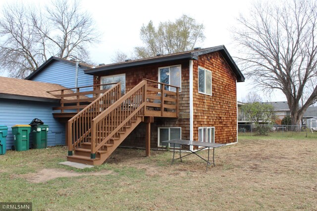 rear view of house with a deck