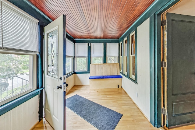 sunroom / solarium with wood ceiling