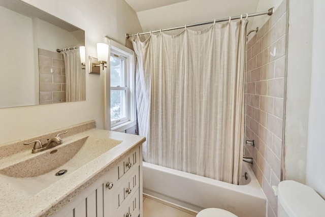 full bathroom with shower / tub combo, vanity, and toilet