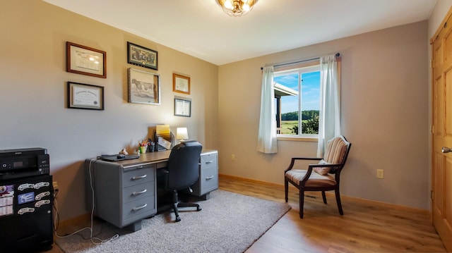 office area with light wood-type flooring