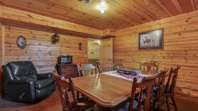 dining area with wood ceiling