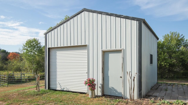 view of outbuilding featuring a garage