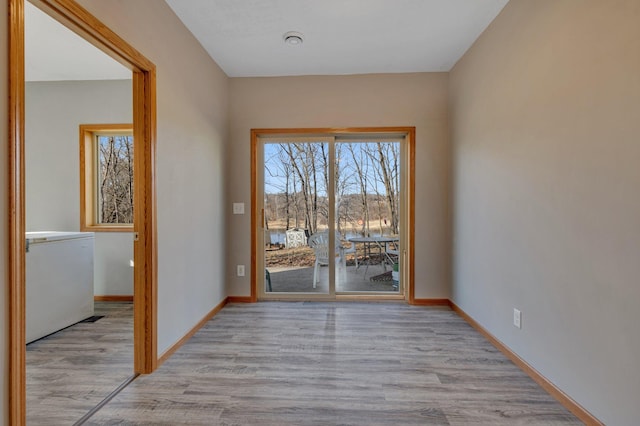 doorway to outside featuring light hardwood / wood-style flooring