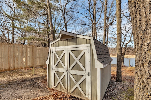 view of outdoor structure with a water view