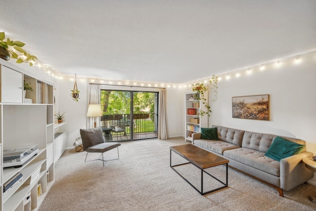 living area with light colored carpet