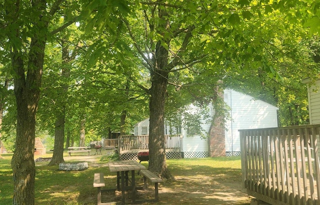 view of yard with a deck