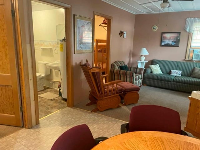 living room featuring ceiling fan