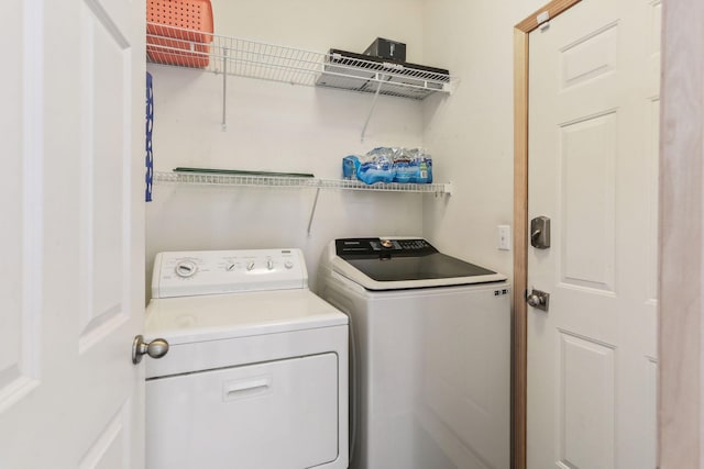 laundry area with washer and clothes dryer