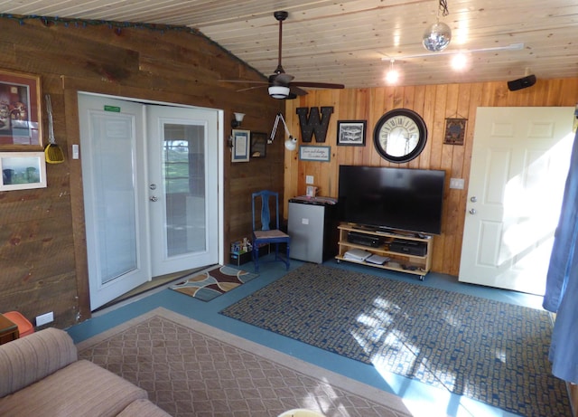 49215 Middle Leaf Rd, Henning, MN 56551 - living room featuring wood ceiling, wooden walls, lofted ceiling, and ceiling fan