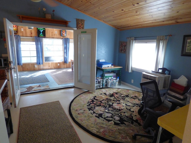 home office with lofted ceiling and wooden ceiling