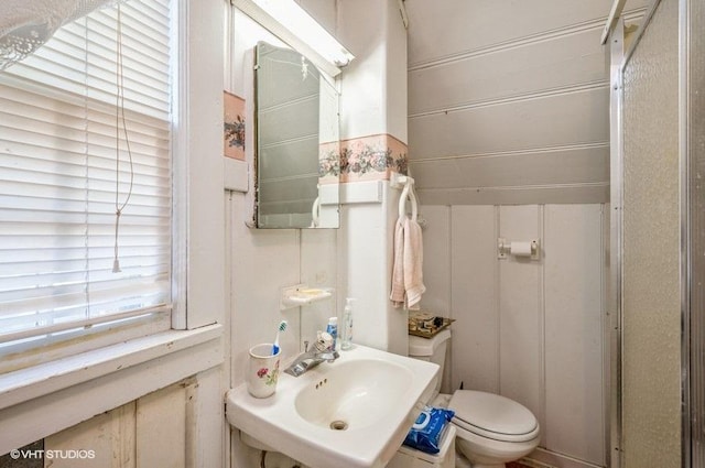 bathroom with sink and toilet