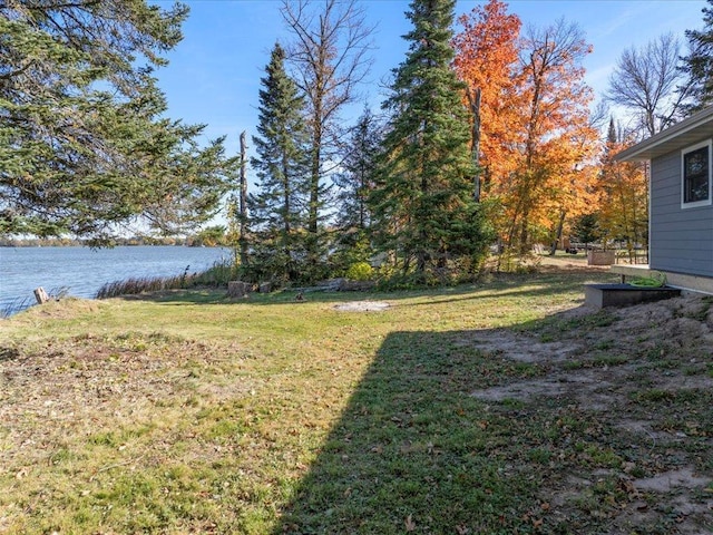 view of yard with a water view