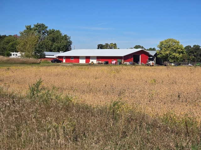 30925 County Road 5 NW, Spencer Brook Twp, MN 55371 - view of front of house with an outbuilding