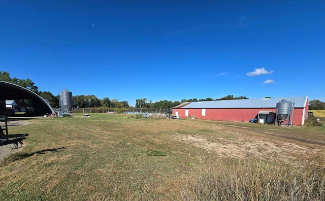 30925 County Road 5 NW, Spencer Brook Twp, MN 55371 - view of yard with an outdoor structure, a water view, and an outbuilding