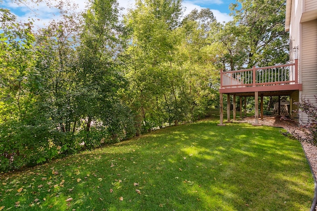 view of yard featuring a deck