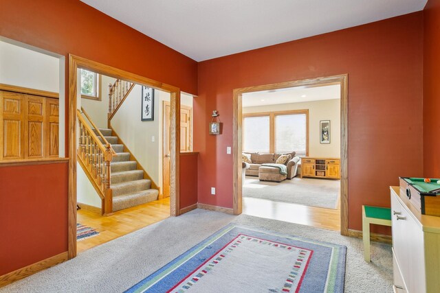 view of carpeted foyer