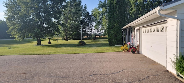 garage with a yard