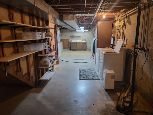 basement featuring washing machine and dryer