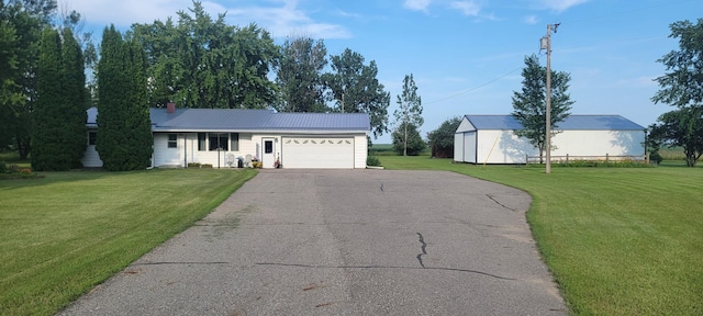 ranch-style house with a front lawn and a garage