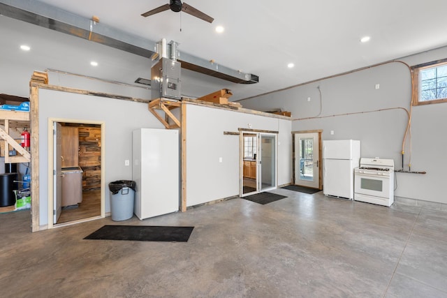 garage with freestanding refrigerator, ceiling fan, and recessed lighting