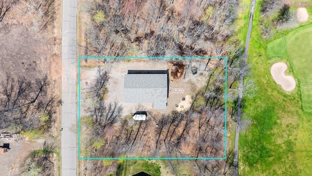 birds eye view of property featuring golf course view