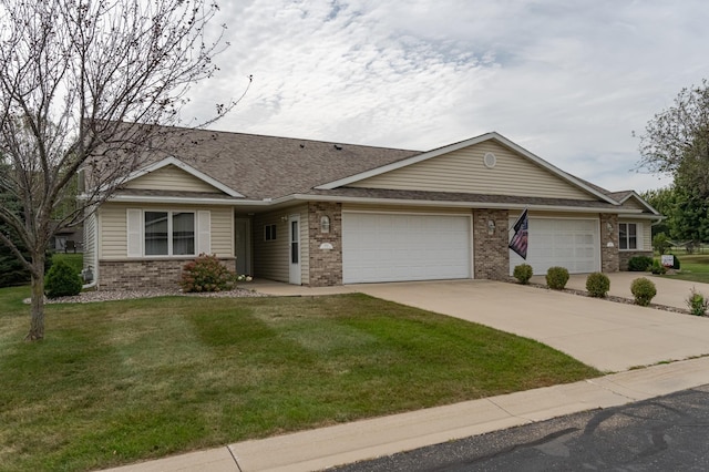 single story home featuring a front yard and a garage