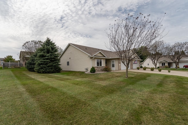 view of property exterior with a lawn