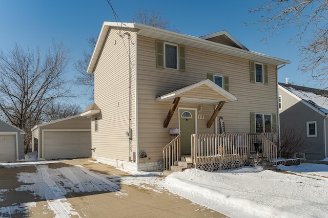 view of front of home featuring an outbuilding and a detached garage