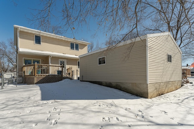 view of snow covered house