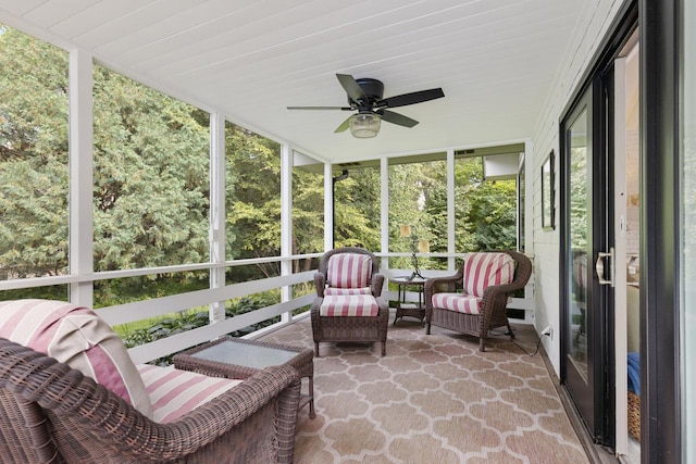 sunroom / solarium with ceiling fan