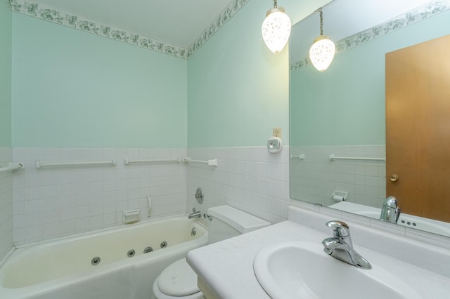 bathroom featuring tile walls, a bathing tub, toilet, and vanity