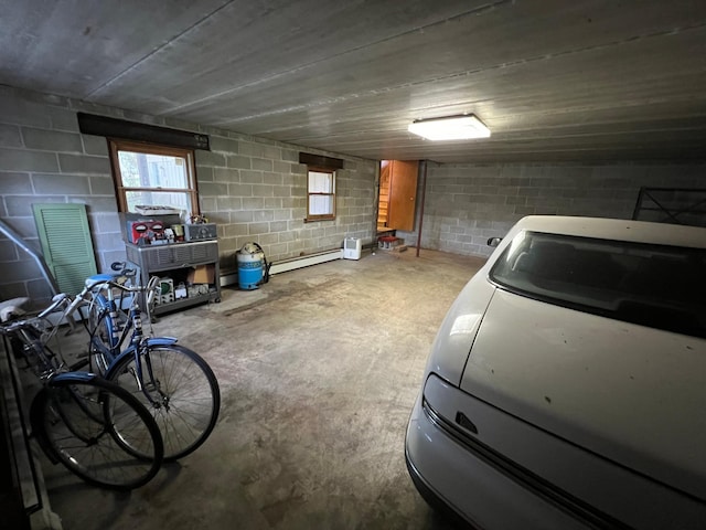 garage with a baseboard heating unit