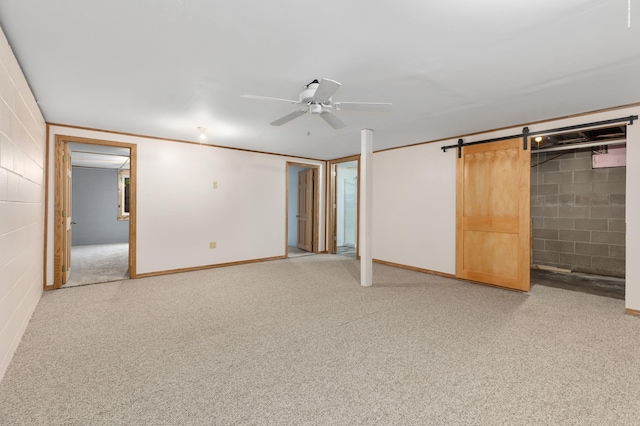 2135 24th Ave SW, Pine River Twp, MN 56474 - finished below grade area with concrete block wall, ceiling fan, light colored carpet, and a barn door
