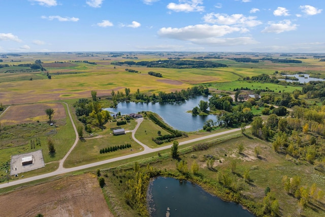 bird's eye view featuring a water view and a rural view