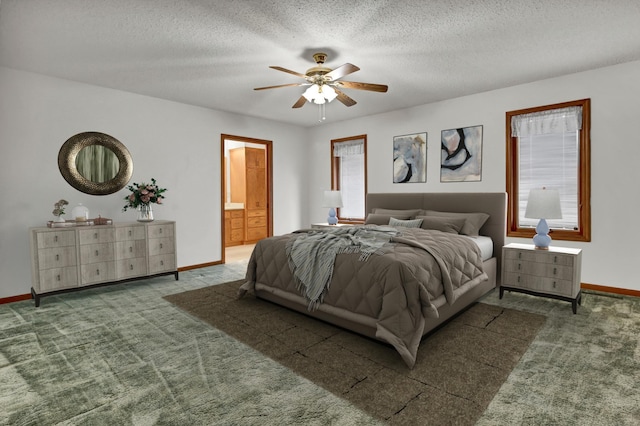 bedroom with baseboards and carpet floors