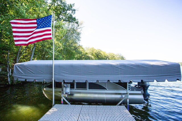 view of dock featuring boat lift