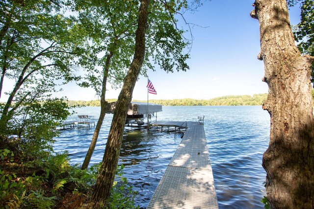 view of dock with a water view