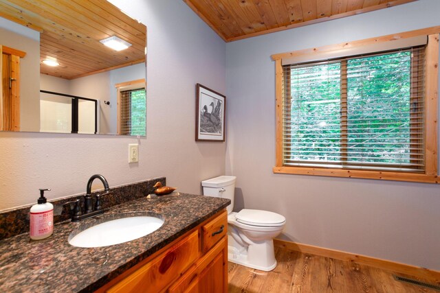 full bath with a wealth of natural light, a shower stall, and wooden ceiling