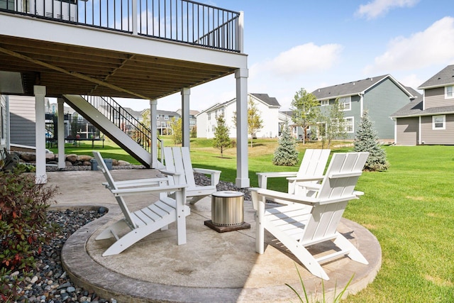 view of patio / terrace with a fire pit