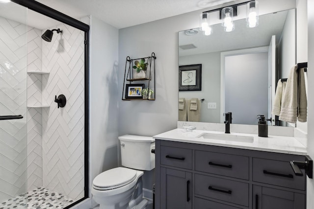 full bath featuring visible vents, a shower stall, toilet, and vanity