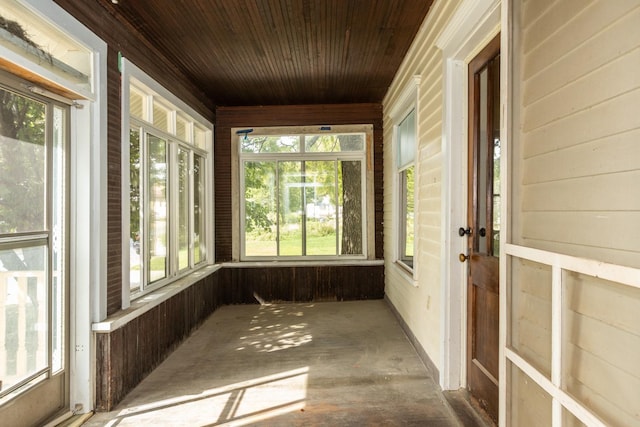 unfurnished sunroom with a healthy amount of sunlight